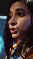 Poster - Vertical video AI expert showcasing new cutting edge technologies, discussing industry advancements. Extreme close up of woman sharing latest developments in AI and Big Data industries, camera B