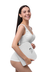 Poster - Diet and weight loss concept. Happy young woman with floor scale on white background