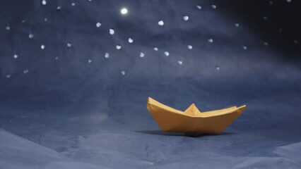 Wall Mural - A dark blue sky with a few stars and a few clouds