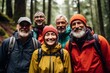 © NikoG - Portrait of a smiling group of senior hikers in rain jackets