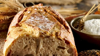 Poster - rustic loaf bread on wood background