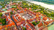 © MKavalenkau - aerial view over the castle square in warsaw overlooking the old town in spring at dawn