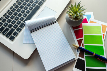 Poster - Office desk table with colour swatches book computer laptop, empty notepad pen