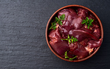 Poster - Raw chicken giblets liver, meat background.