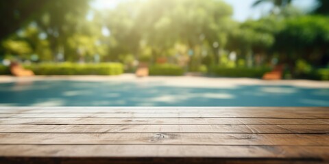 Wall Mural - Wooden Table Top Overlooking a Poolside Paradise