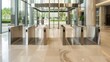 © lililia - Three stainless steel security gates in a modern office building entrance