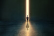 © GVS - Man walks towards the light in dark empty space. Light at the end of the tunnel concept
