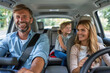 © fanjianhua - A family driving a car