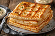 © pisan - Matzo Bread Stacked on a Festive Table for Passover Unleavened Bread, Holiday Traditions, Kosher Recipes, Jewish Celebrations, Seder Dinner, Traditional Cuisine, Matzo Recipes