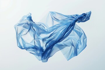 Poster - A piece of blue fabric floats gently through the air, caught in a moment of motion