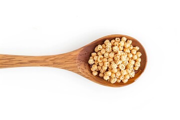 Poster - A wooden spoon filled with chickpeas, placed on a clean white surface