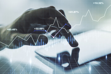 Poster - Double exposure of abstract creative financial chart with finger clicks on a digital tablet on background, research and strategy concept