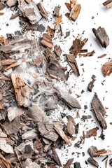 Aufkleber - A pile of wood chips on a white surface