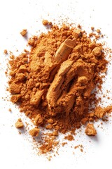 Poster - A pile of brown powder on a white surface