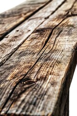 Poster - A close-up view of a wooden table with a white background, suitable for use in various contexts where a simple, neutral surface is needed