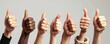 © CozyDigital - No to racism. Equality. Clenched fists and thumbs up of people of different skin colors on gray background