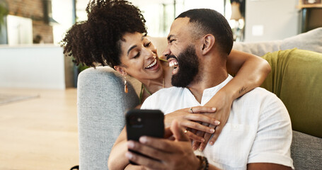Poster - Couple, hug and laughing for phone in home with social media meme, internet joke and comic notification. People, happy and smartphone in living room with funny web search, bonding or embrace in house