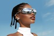 © Rawpixel.com - Black young woman smiling wearing a white sunglasses exposing her eyes portrait fashion adult.