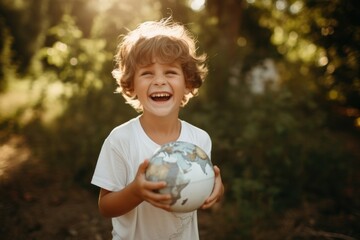 Poster - Holding the globe laughing outdoors portrait.