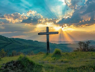 Wall Mural - weathered wooden cross silhouetted against a golden sunset standing atop rolling green hills rays of light breaking through dramatic clouds creating a spiritual atmosphere