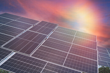 Poster - Green energy solar panel as alternative electricity source at sunset