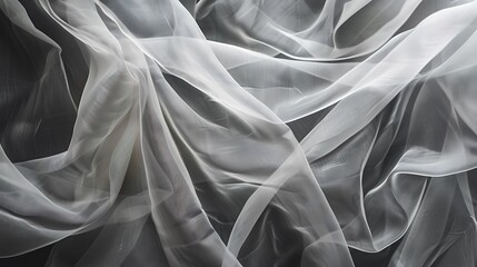 White Sheer Fabric Draped on Black Background