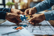 © btiger - Collaborative Engineering Teamwork Joining Puzzle Pieces for Success in Office Environment