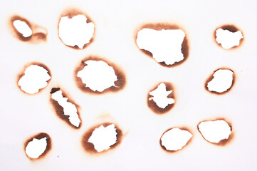 Wall Mural - Set of burnt holes of paper, texture and background