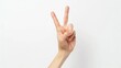 © Matcha_09 - Woman's hand showing a peace sign, white background