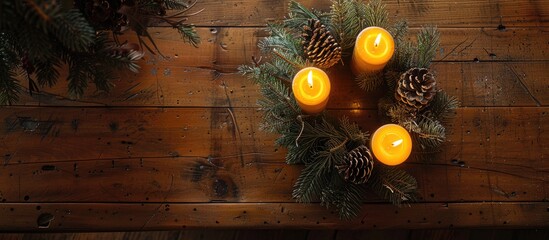 Aufkleber - Top view of an advent wreath with two lit candles atop an antique wooden table, creating a cozy ambiance in the copy space image.