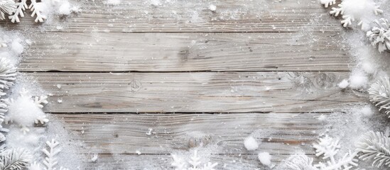 Aufkleber - Light grey wooden background with snowy frame for a copy space image.