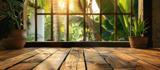 Poster - Wooden table with no items on it and a blurry background window with room for text or images, suitable for exhibiting products in a visual display.