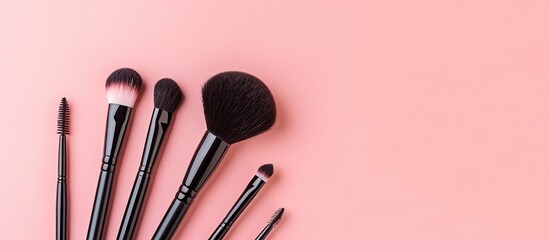 Poster - Makeup brushes in a flat lay composition on a pink background with a top view and copy space image. It displays makeup accessories as a mockup template.