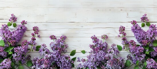 Sticker - Top view floral arrangement with lilac flowers on white wooden backdrop creating space for additional content in the image.