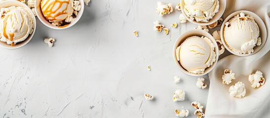 Wall Mural - White table with ice cream, caramel, popcorn, and copy space image.