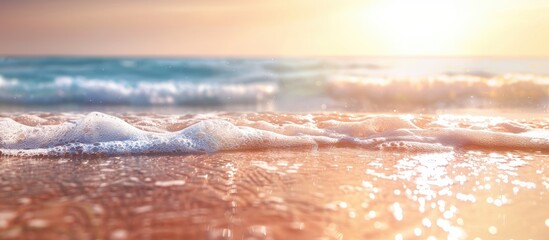 Poster - A blurry beach scene with sunlight and vibrant colors on the ocean coast in summer, ideal for a copy space image.