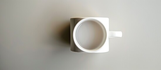 Aufkleber - Top view of a white coffee mug with copy space image.