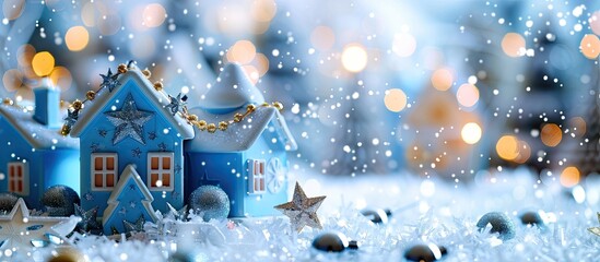 Poster - festive holiday background with blue snow-covered houses, starry necklace, and a blank copy space im