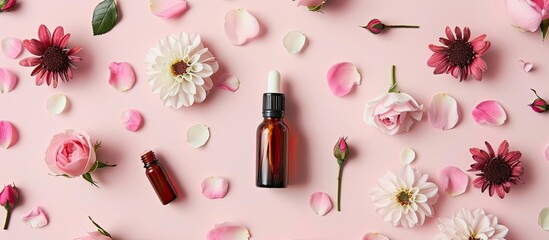 Poster - A flat lay setup featuring rose essential oil, flowers, and a pink background, with room for adding text in the image.