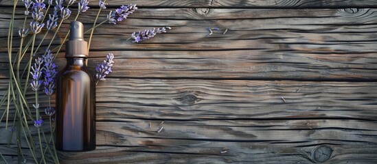 Poster - A bottle for cosmetics placed on a wooden background with lavender flowers, featuring an empty copy space image for advertising.