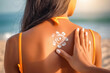 © Tatiana Kolosovskaya - Woman With Suntan Lotion At The Beach In Form Of The Sun