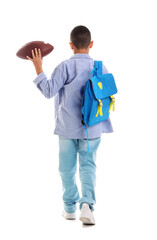 Wall Mural - Little African-American schoolboy with rugby ball and backpack on white background, back view