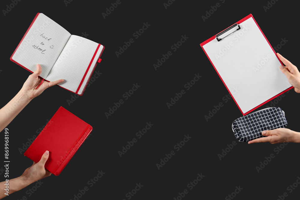 Female hands holding pencil case and notebooks with text BACK TO SCHOOL on black background
