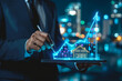 © Roxy jr. - Businessman drawing a glowing growth graph on a digital tablet with a house model, representing the real estate business concept.