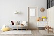 © Pixel-Shot - Stylish interior of hall with cozy sofa, chest of drawers and door