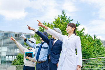 Poster - 空を指さす様々な職業の人々（研究者・ビジネスマン・エンジニア・警備員）