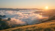 © bird_saranyoo - Tranquil landscape of hills shrouded in morning mist. With the sunrise in the background.