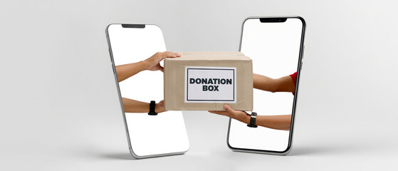 Hands holding donation box pop out from two smartphones facing each other, Concept of delivering donations, volunteering, and community support through digital platforms. Isolated on white background