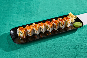 Poster - Shrimp Avocado Roll with Unagi Sauce - Delicious Sushi on Black Plate