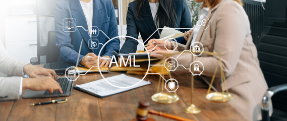 Wall Mural - AML Anti Money Laundering Financial Bank Business team Concept. judge in a courtroom using laptop and tablet